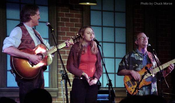 Photo of Tom and Abigail Chapin with Michael Mark